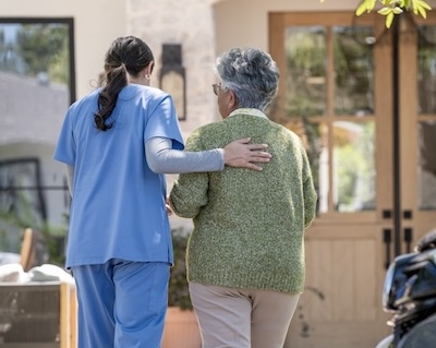 caregiver helping senior