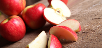 A close-up photo of cut up apples.